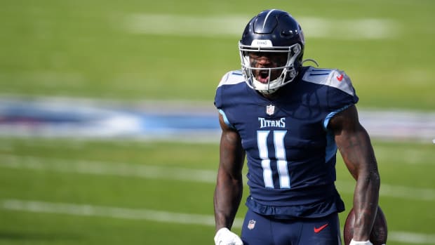 Tennessee Titans wide receiver A.J. Brown (11) reacts after a catch against the Baltimore Ravens during the first quarter in a AFC Wild Card playoff game at Nissan Stadium.